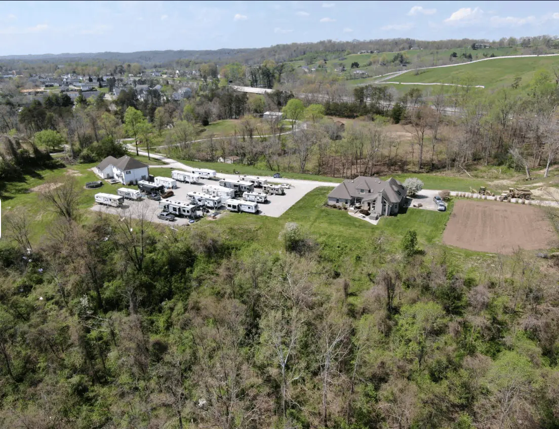 Outlook Pointe Campground on the hillside above Milton, West Virginia, surrounded by trees and open fields